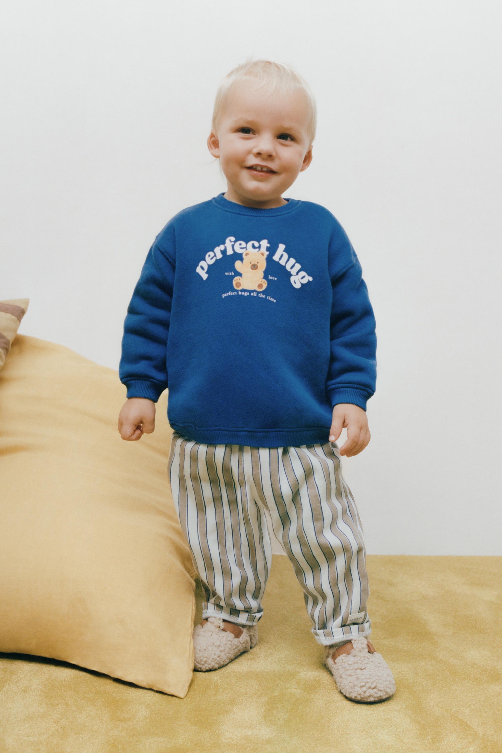 STRIPED BAGGY PANTS WITH LABEL